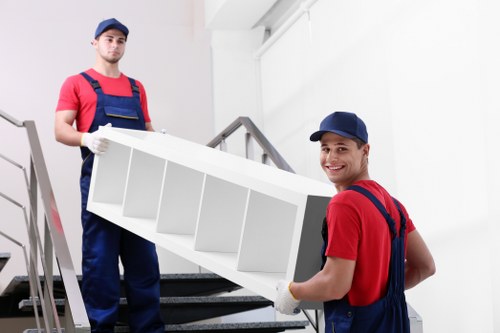 Removal team preparing a move in Finsbury Park with boxes and furniture