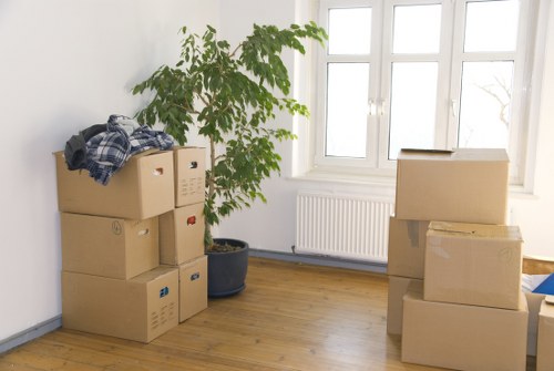 Professional home moving team handling items in Finsbury Park