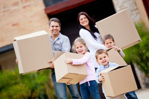 Local removals van helping with flat and office relocations