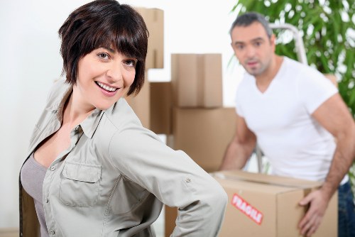 Packed moving boxes and furniture for a local house move